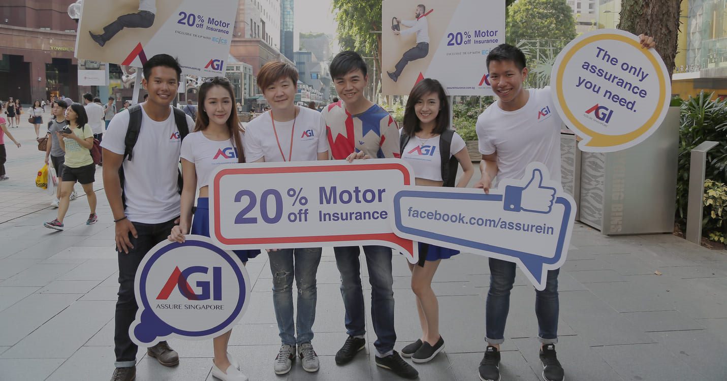 Insurance broker team promoting motor insurance on the street